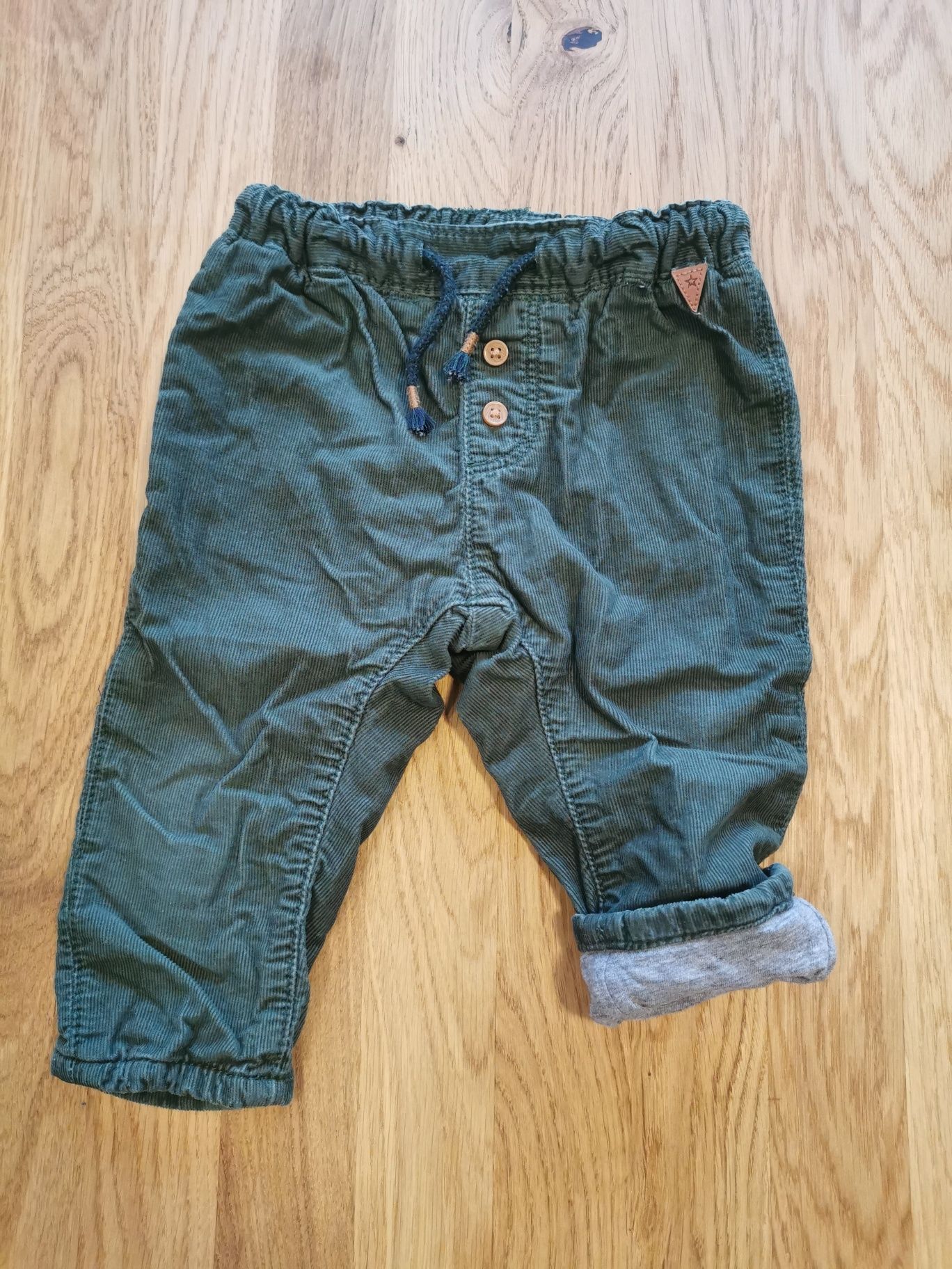 Zielone spodnie sztruksowe H&M r. 74