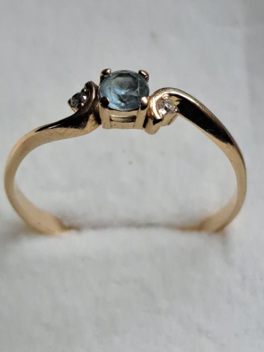 Złoty pierscionek z topazem i diamentami 585 certyfikat