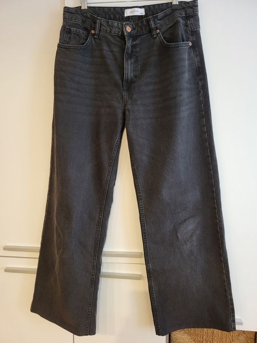 Modne szerokie jeansy Reserved r.42