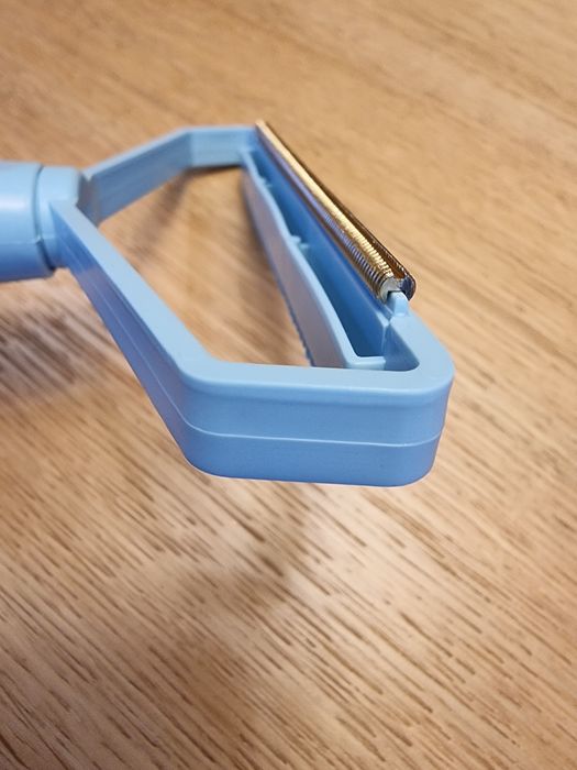 Grzebień szczotka golarka do zmechaceń ubrań