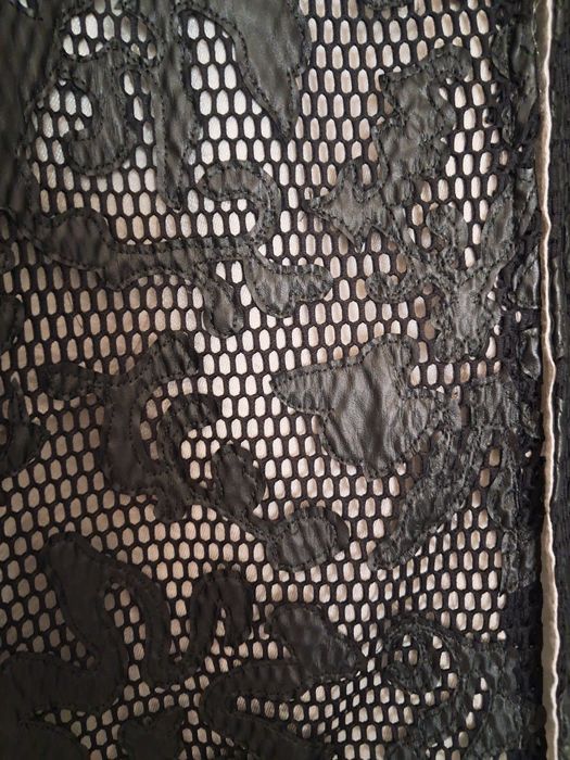 Casaco preto arrendado