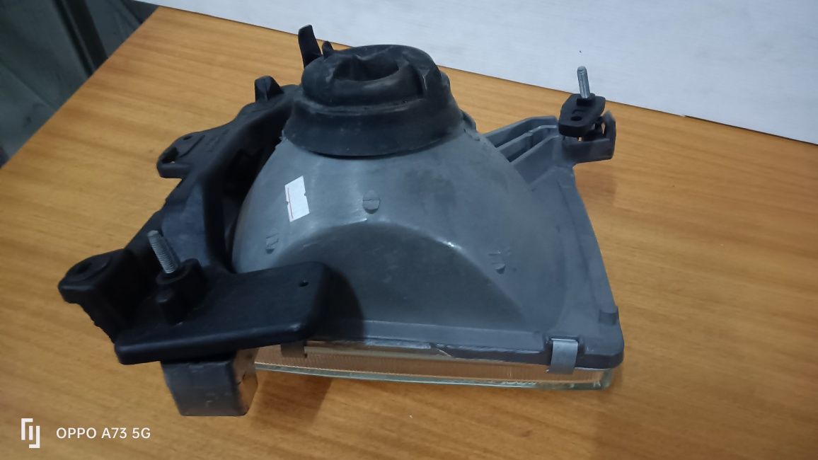 Farol Nissan Navara D22 ótica esquerda Depo