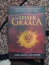 Spisek Graala, L. Sholes, J. Moore