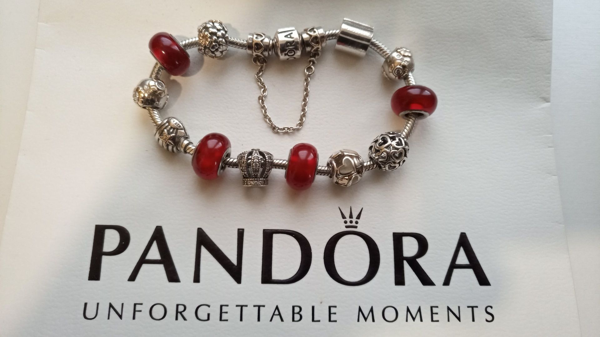 Pulseira e contas Pandora Ouro