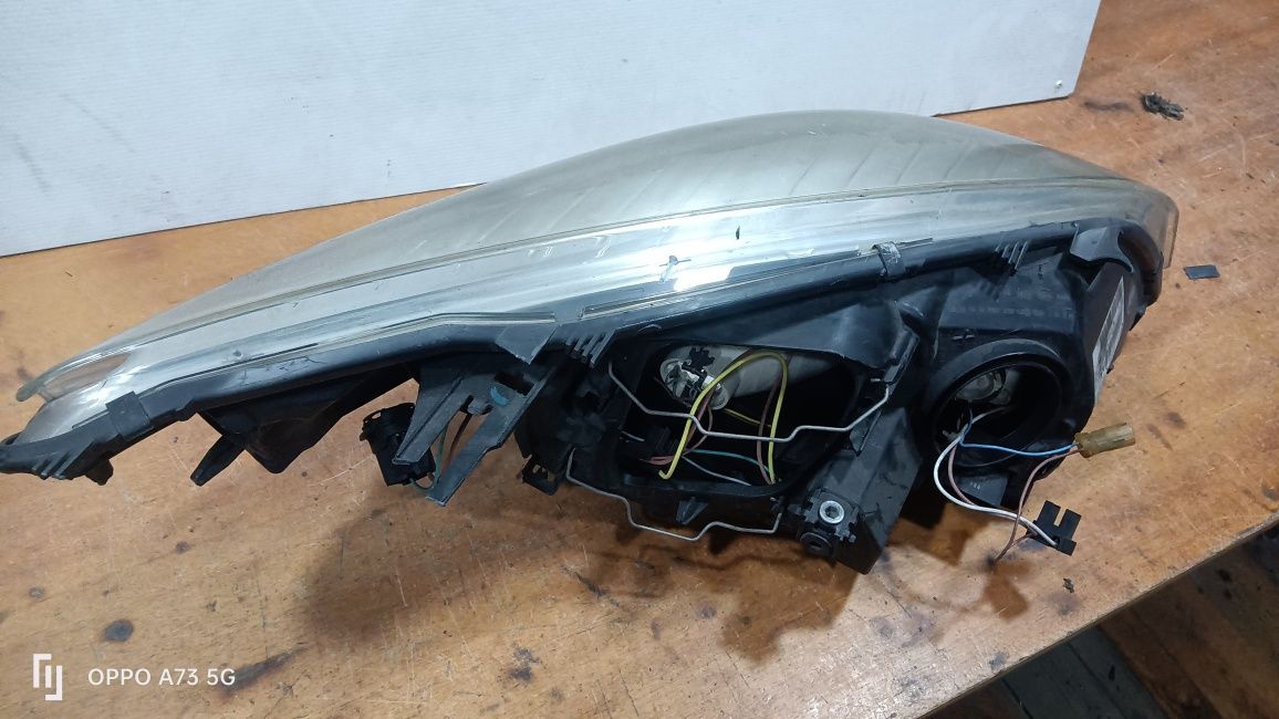 Farol Renault Megane 3 ótica 2009