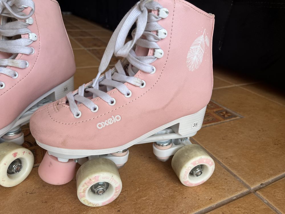 Patins de menina rosa com oferta joelheiras