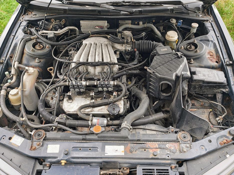Mitsubishi Avance 2.5 manual części silnik pół oś skóra fotele drzwi