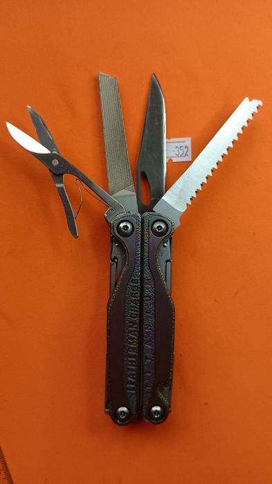 Мод на мультитул Leatherman Charge TTi (титановые накладки) с чехлом