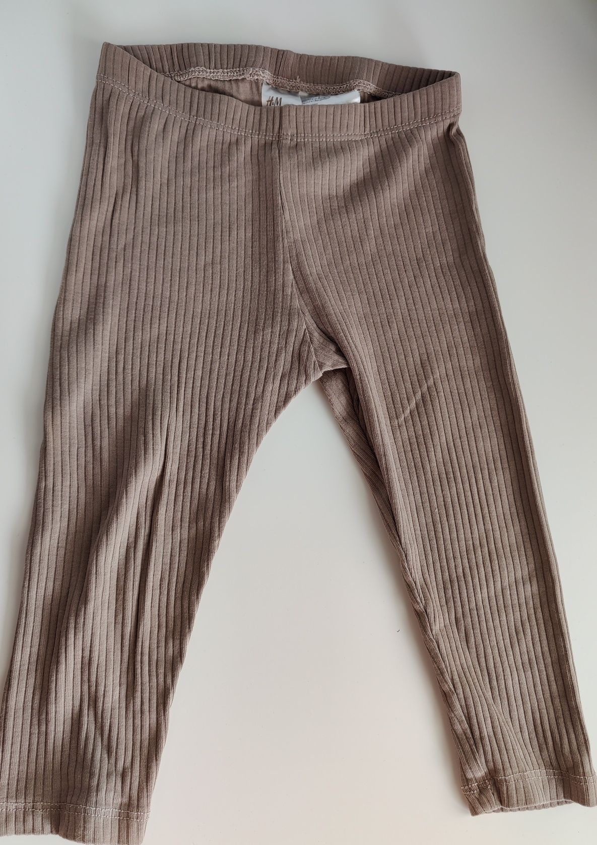 Brązowe beżowe legginsy w prążki H&M r 86