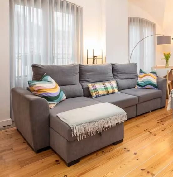 Sofá-cama cinzento moderno com arrumação e função cama - confortável