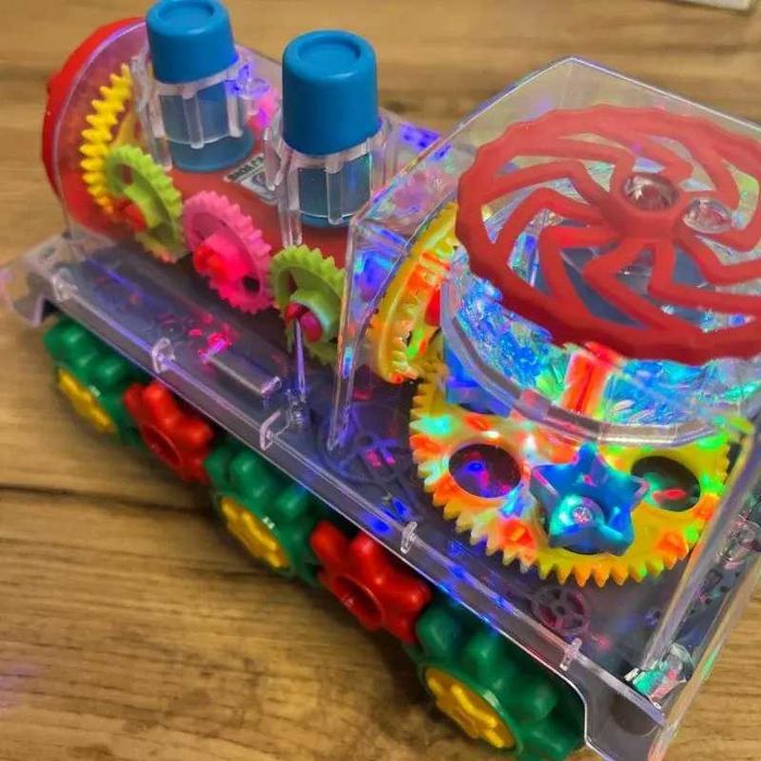 Дитячий інтерактивний прозорий поїзд зі світлом, музикою та поворотом