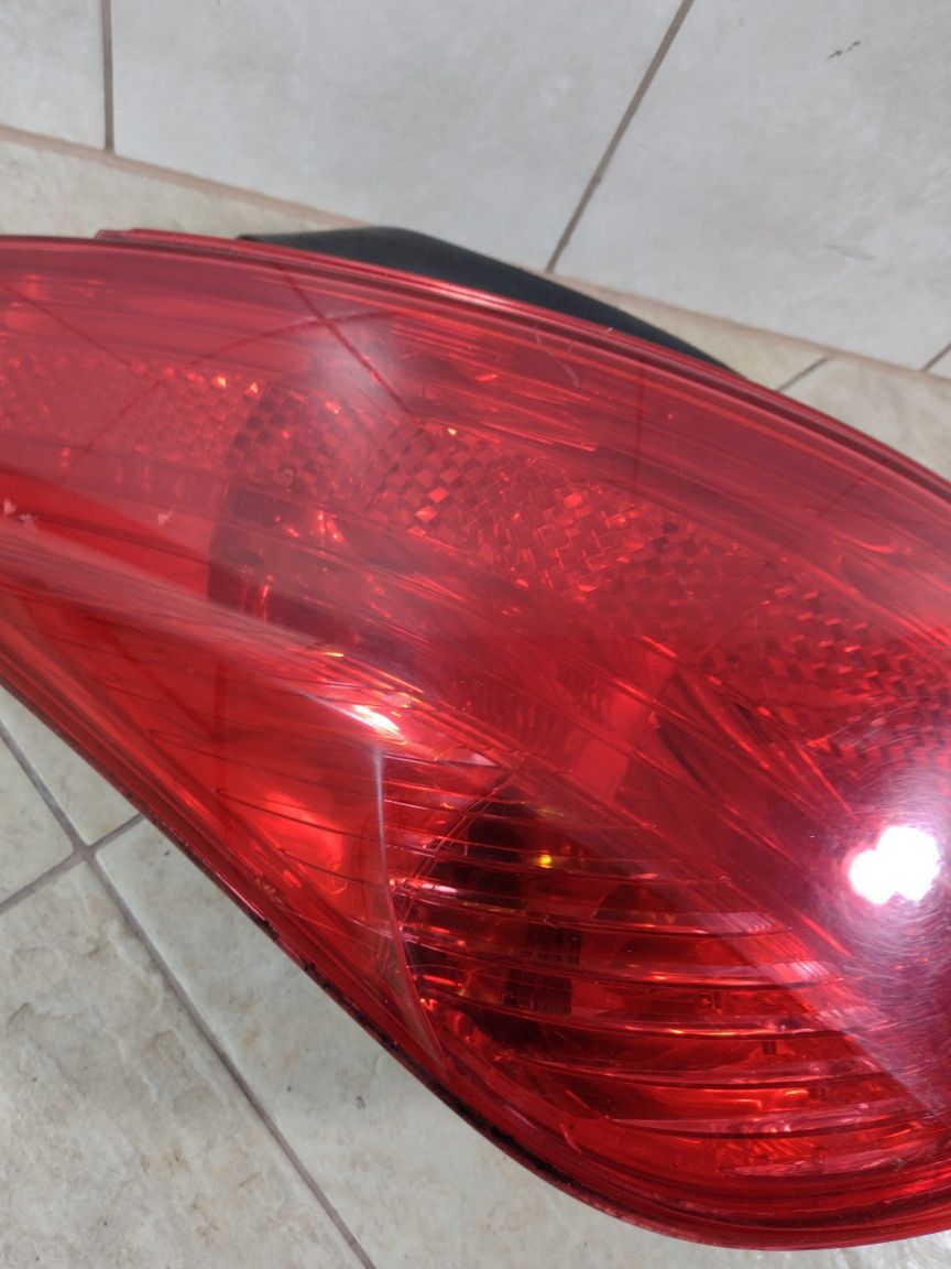 Peugeot 308 HB 3D lampa lewy  tył oryginał wysyłka OLX wkład Europa