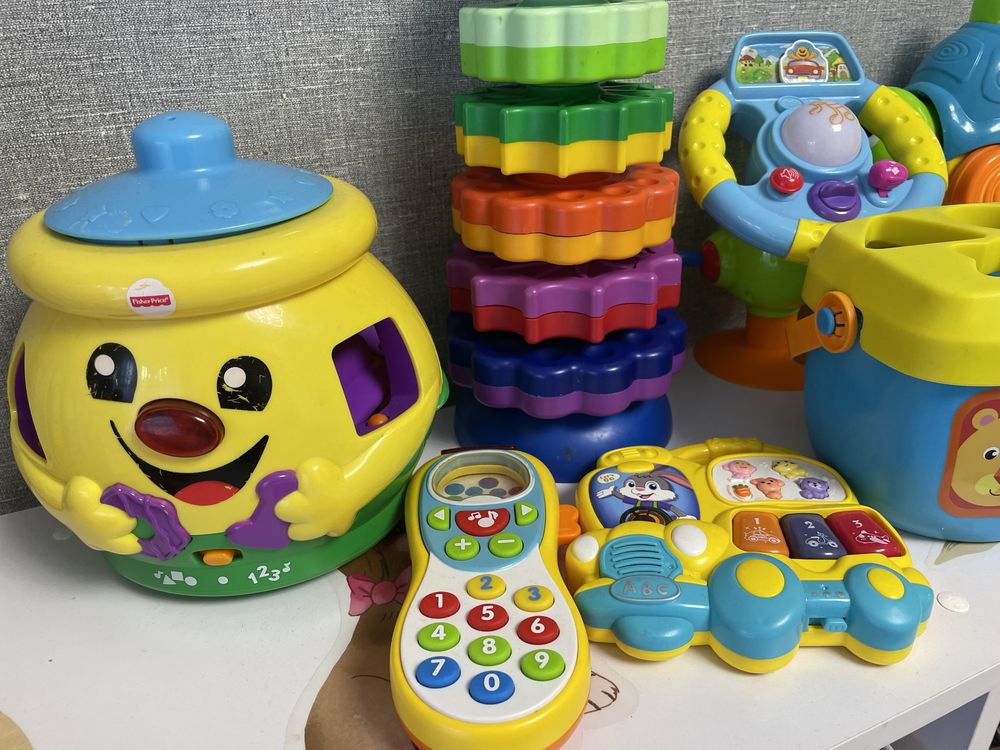 Розвиваючі іграшки монтесорі сортери fisher price