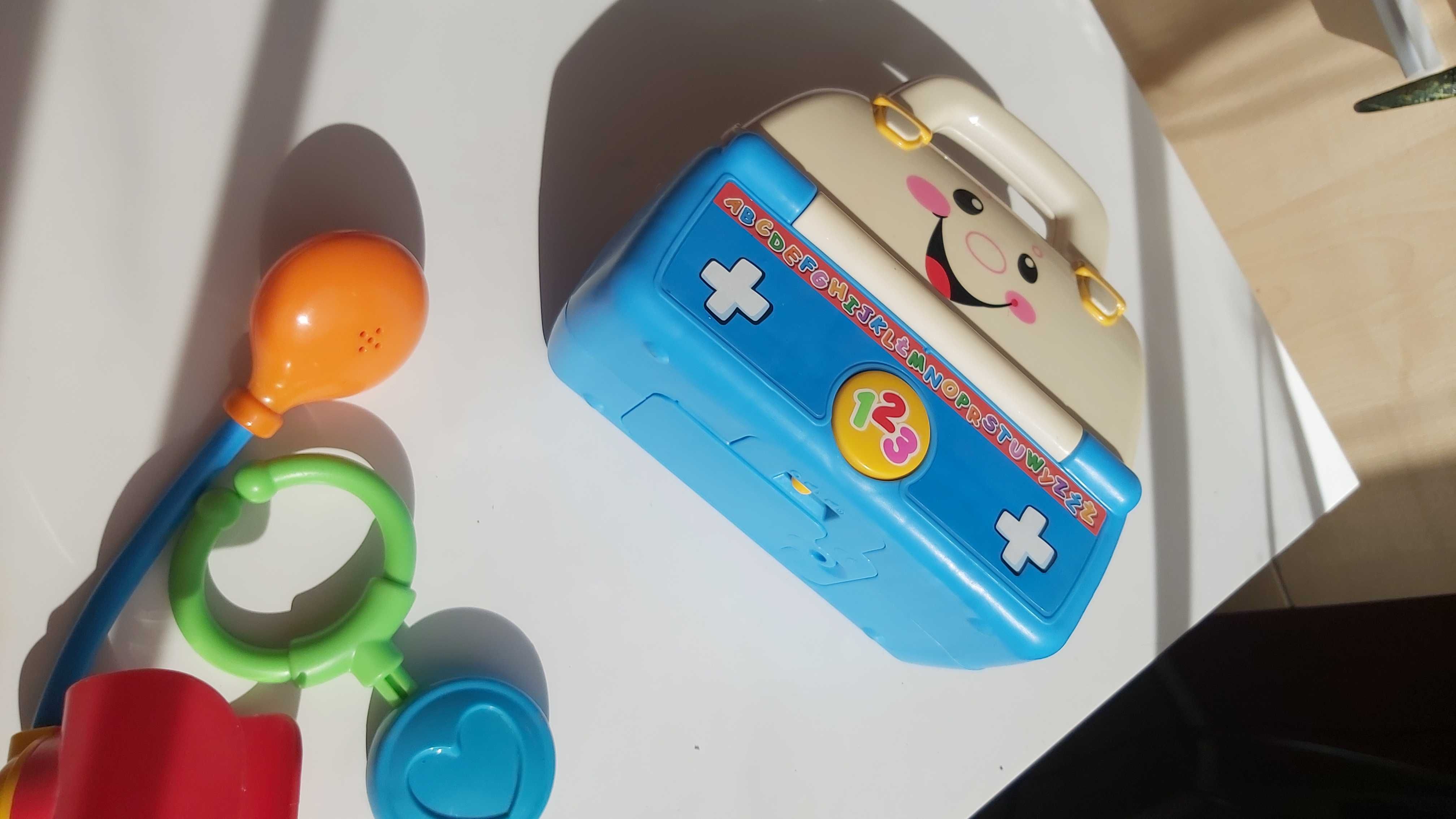 Fisher price śpiewający zestaw małego lekarza język polski
