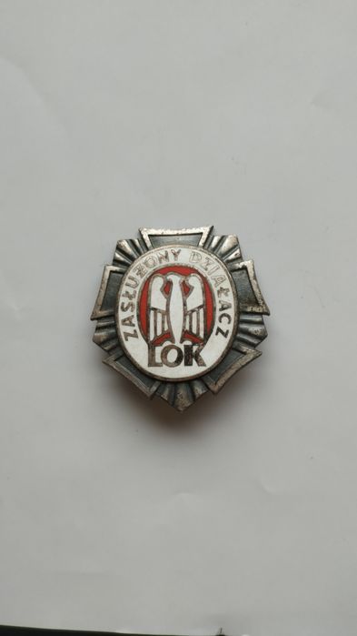 Odznaka Zasłużony Działacz.