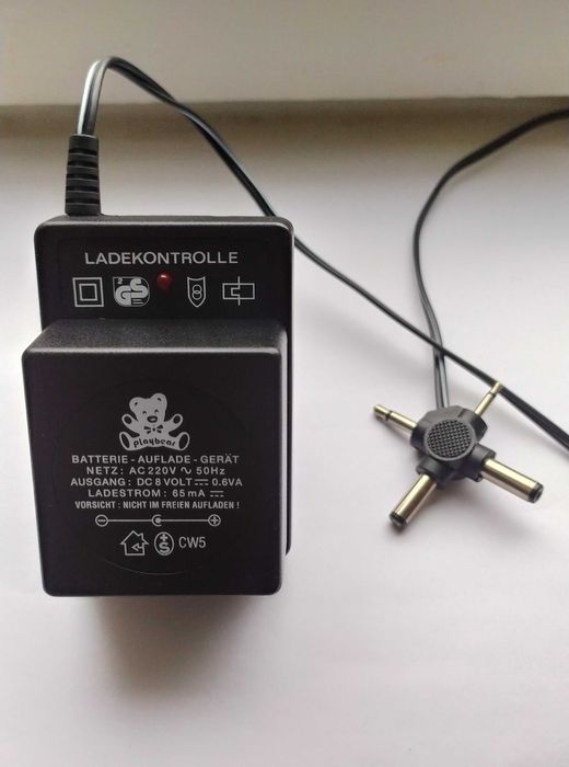 135 гривен Блок питания , Зарядное устройство , Штекер 4 в 1 / Germany