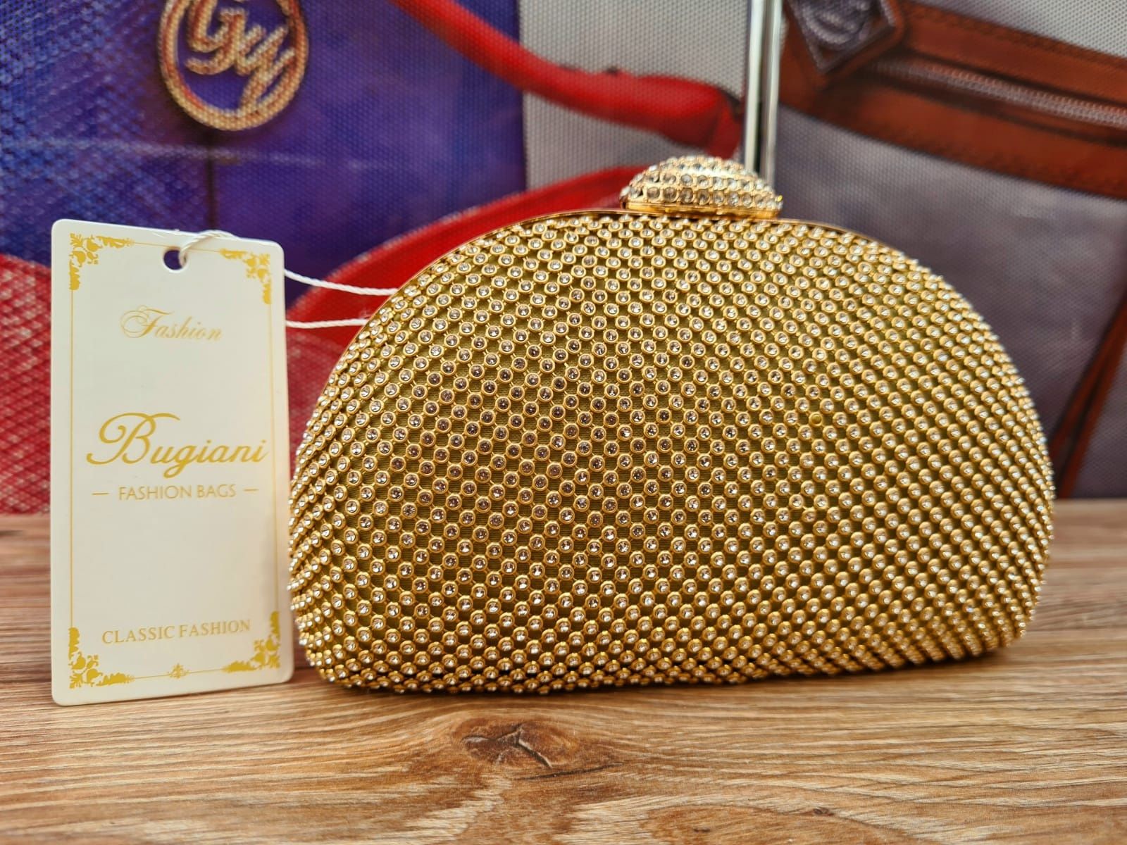 Nowa złota piękna torebka Kopertówka z cyrkoniami Bugiani