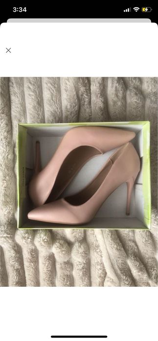 Туфлі лодочки на підборах