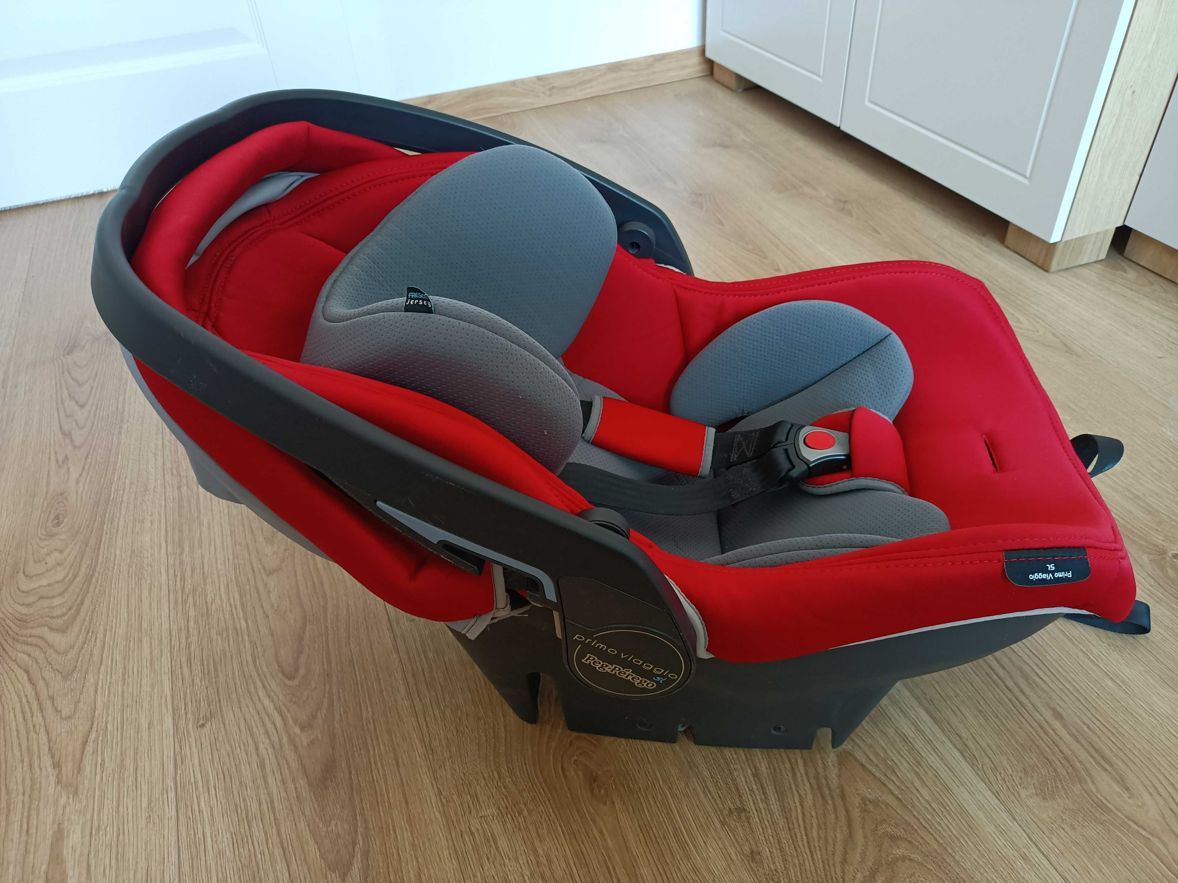 Fotelik-nosidełko Peg-Perego 0-13 kg wraz z bazą Isofix