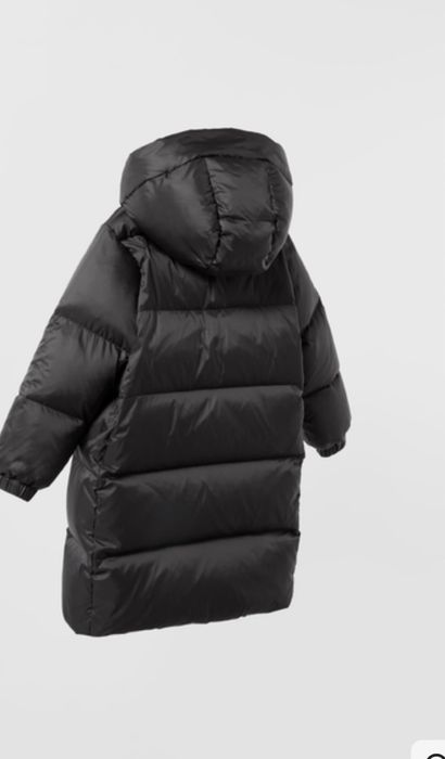 Пуховик 116 чорного кольору