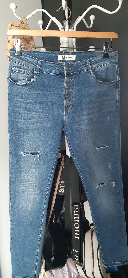 Nowe jeansy z wysokim stanem M.Sara rozm L/XL
