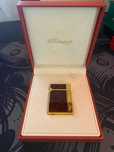Isqueiro S.T. Dupont Folheado a Ouro e Laca Natural
