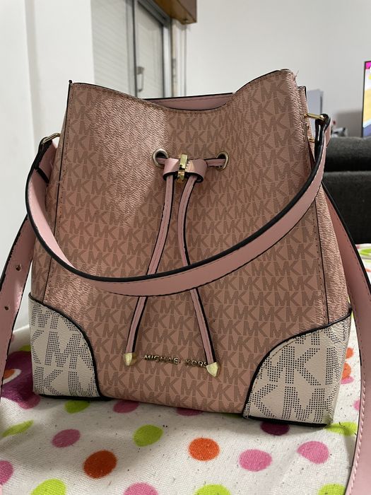 Bolsas Yves Saint Laurent e Michael Kors