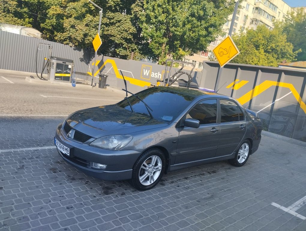Митсубиси Лансер 9 2л .