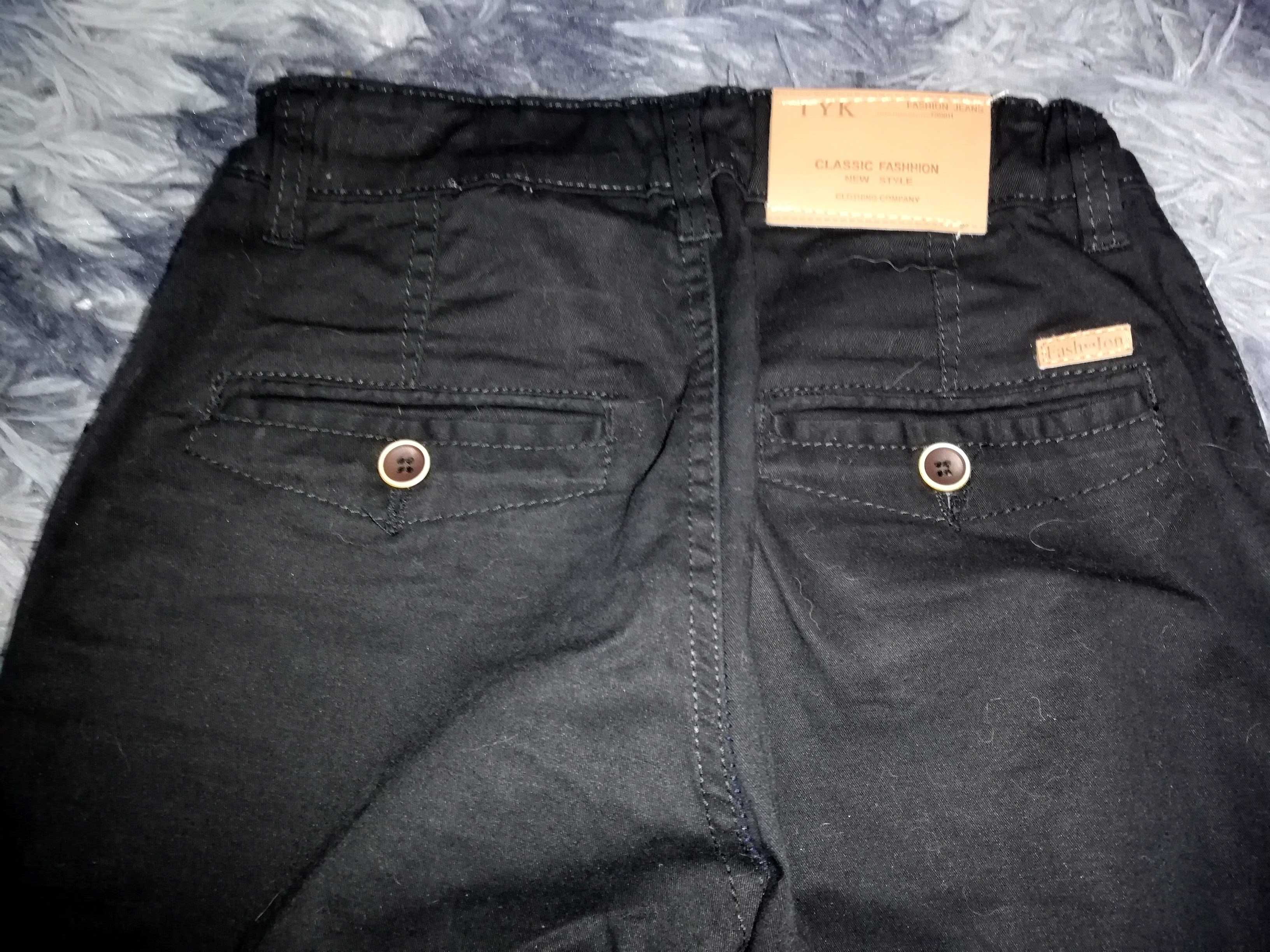 Czarne jeansy spodnie 134/140