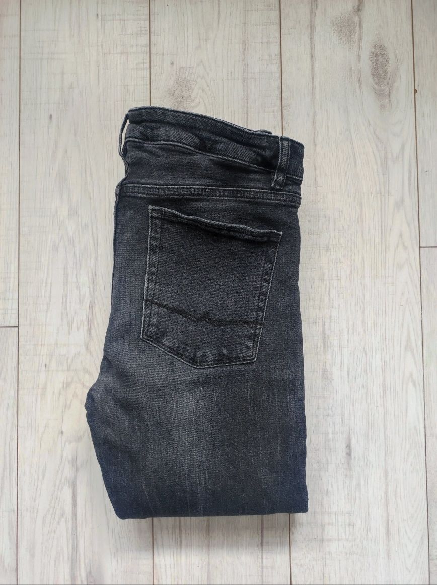Asos świetne czarne jeansy Skinny ripped dziury rozm.W32