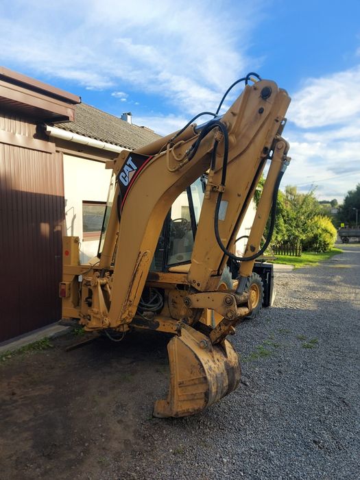 Koparko ładowarka Caterpillar 428d