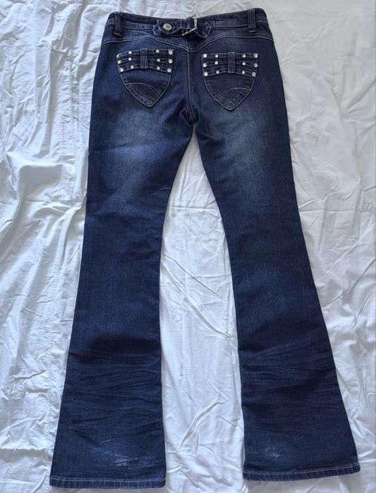 вінтажні кльош джинси на низькій посадці