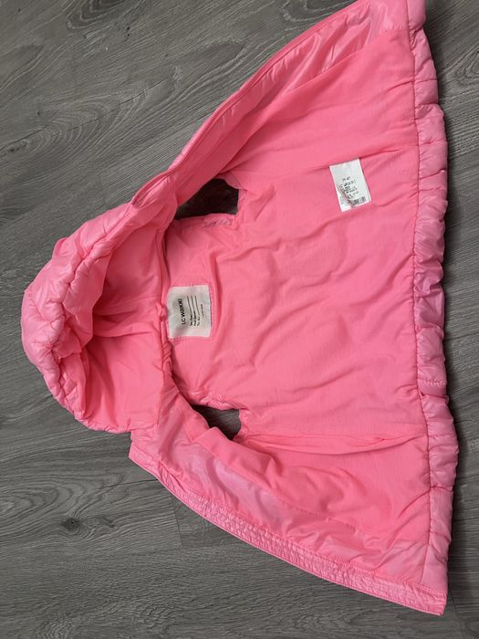 Стильна яскрава безрукавка для дівчинки