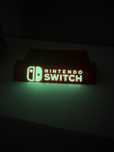 Stojak Podstawka na Gry Nintendo Switch Napis Fluorescencyjny