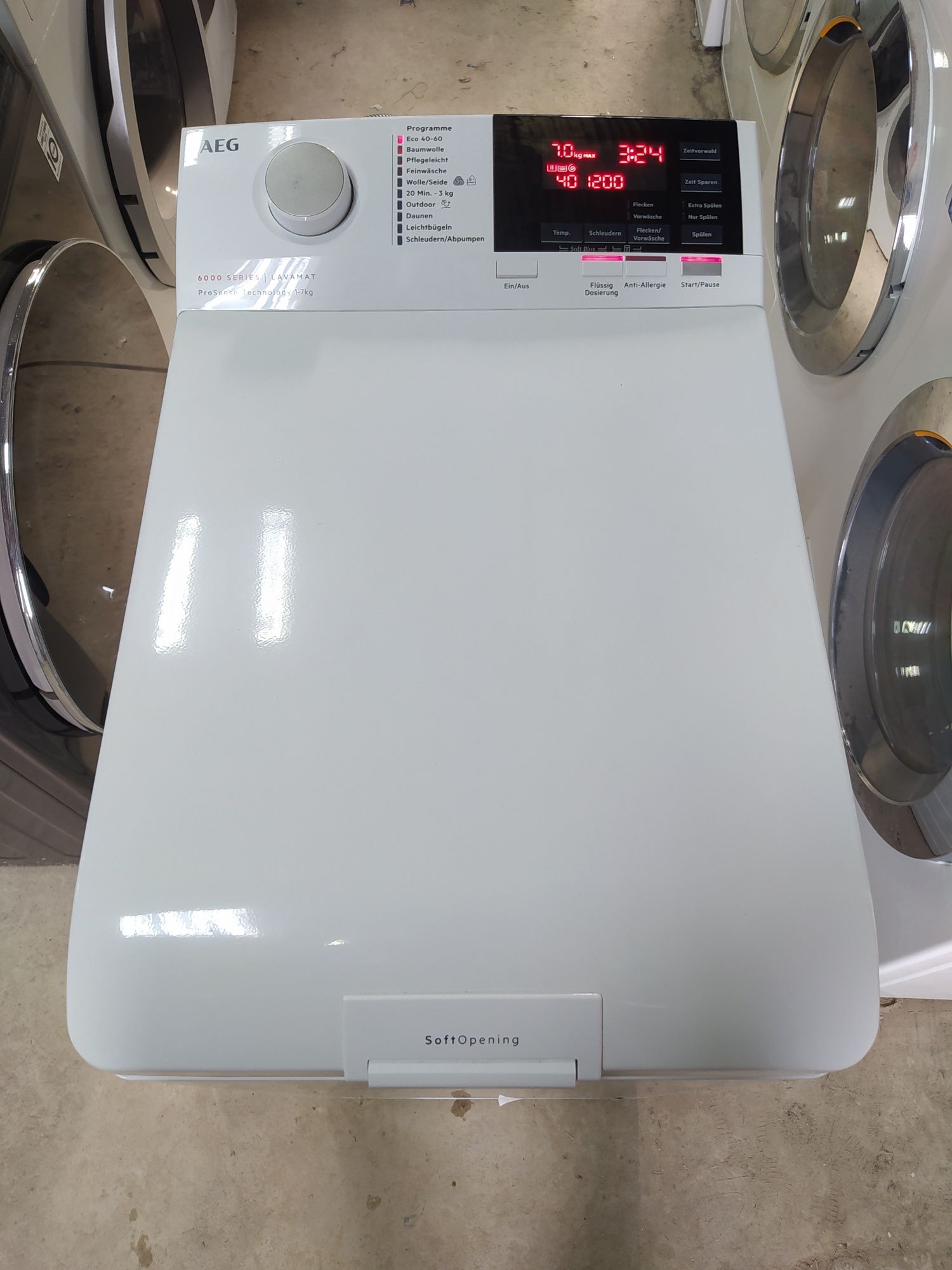Вузька пральна машина з верхнім завантаженням AEG L6TB64279