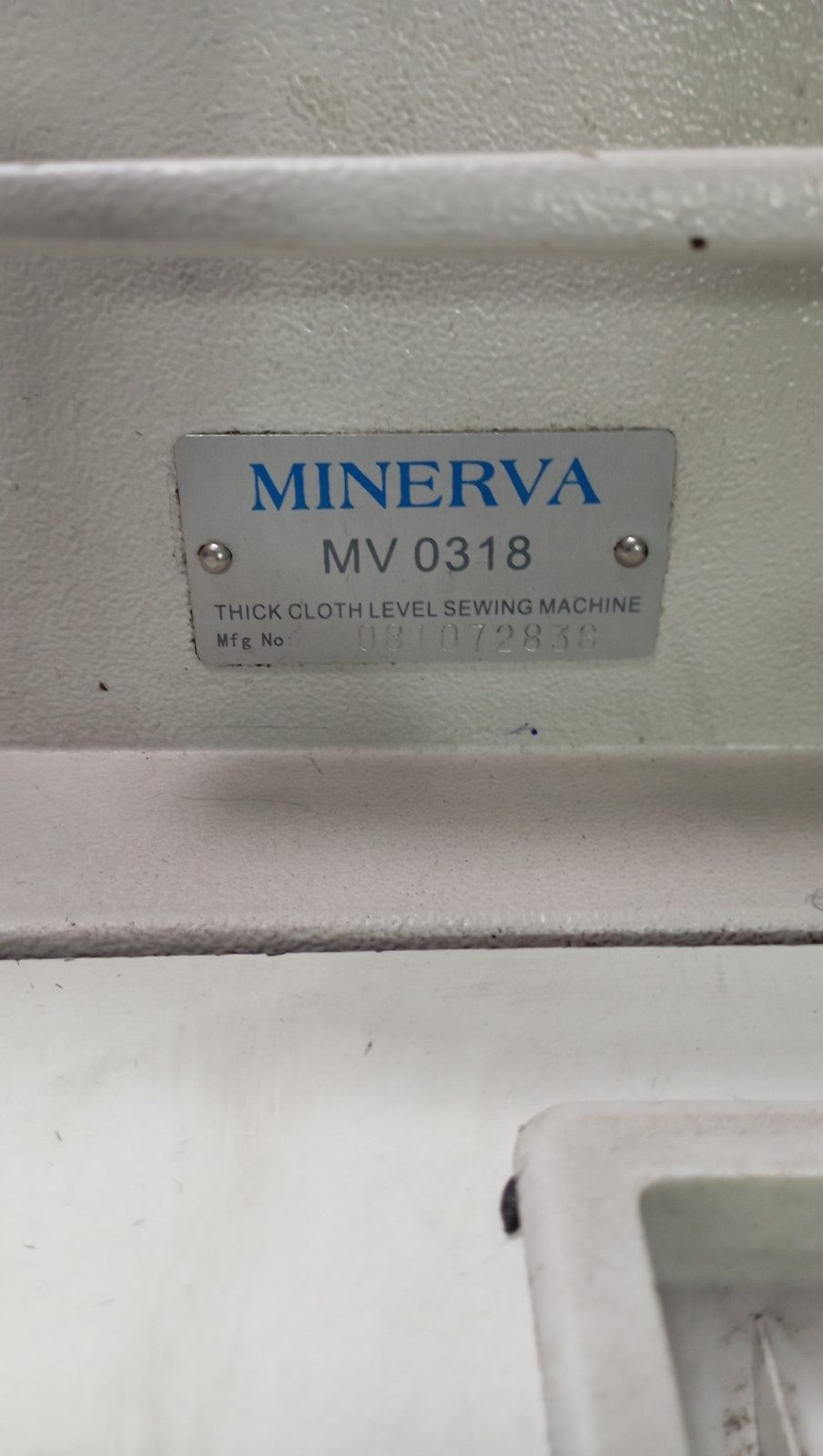 Промислова швейна машинка,,Minerva,,з крокуючою лапкою.