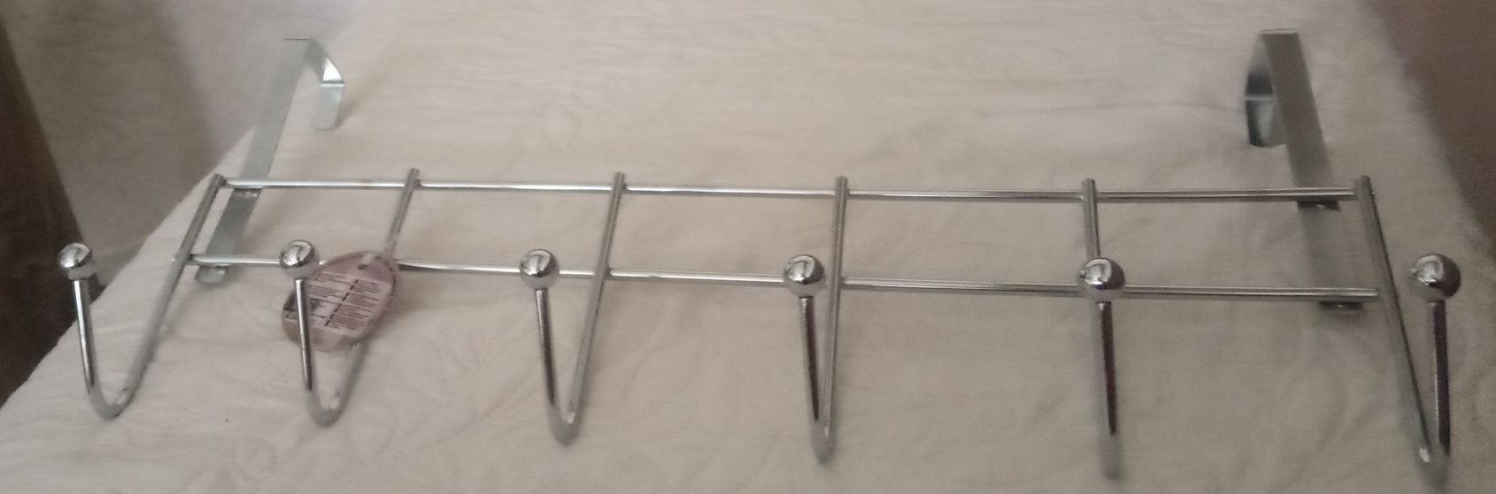 Wieszak niklowany na drzwi 46 cm