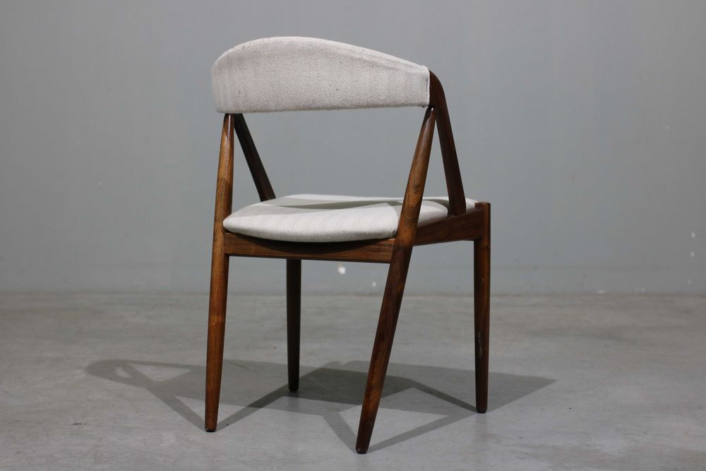 Cadeiras Kai Kristiansen modelo 31 em pau santo | Schou Andersen