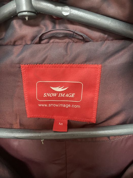 Пуховик зимний женский