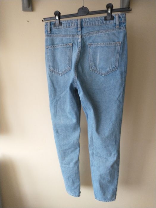 Spodnie jeansowe z dziurami i przetarciami wysoki stan Zero r. 36