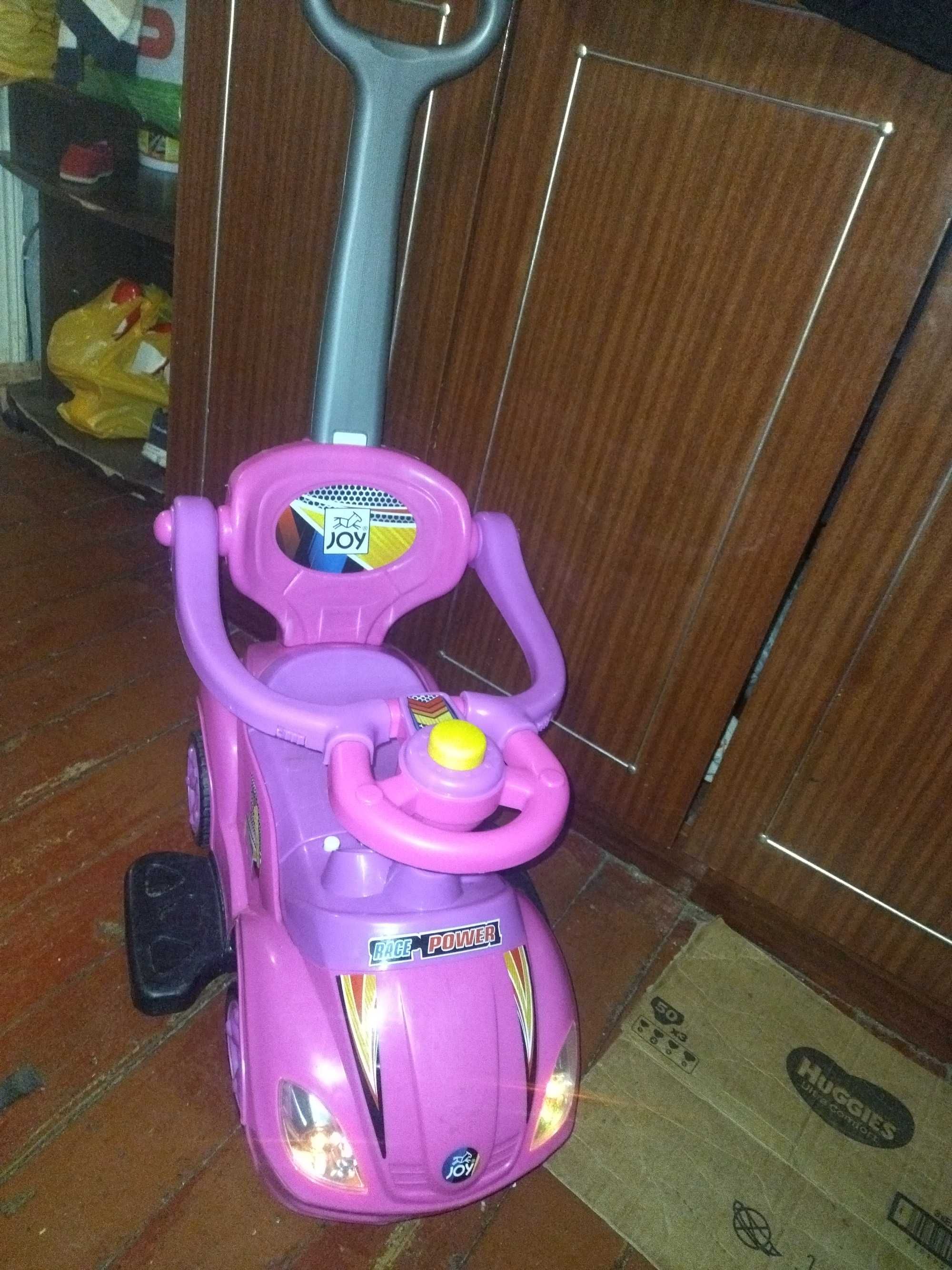 Дитяча машинка для дівчинки