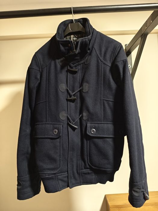 Casaco azul marinho de fazenda em bom estado