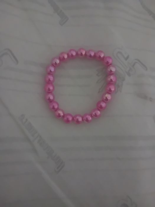 Pulseira de perolas rosa