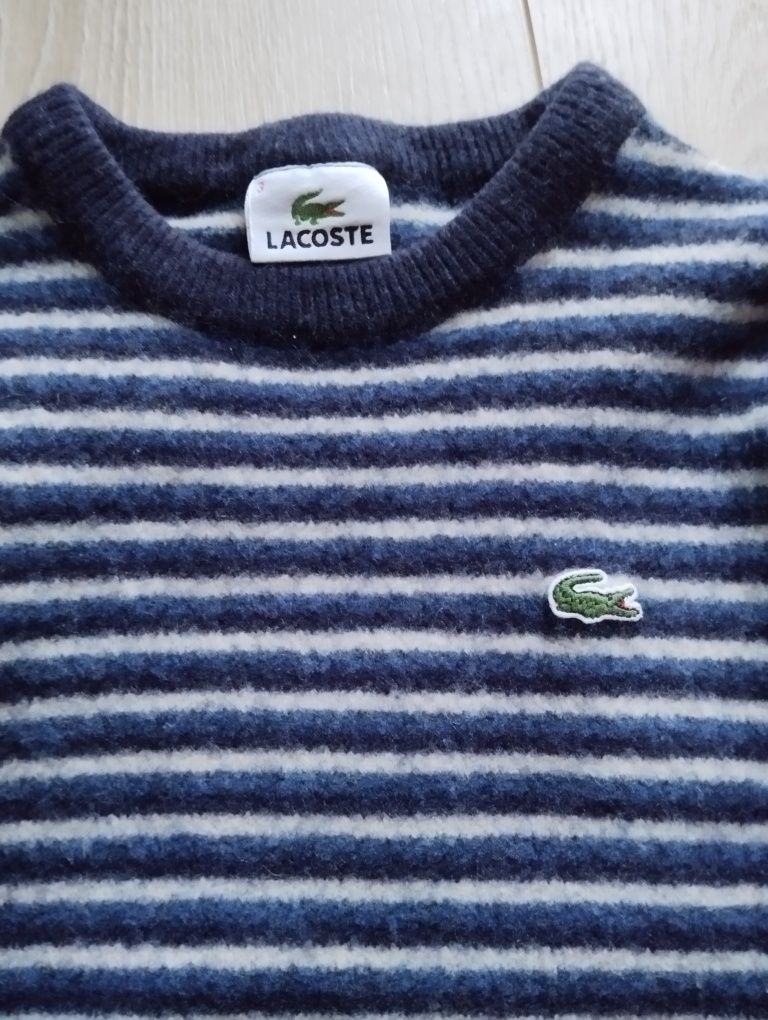 Sweterek  Lacoste chłopiec 122  sweter stan idealny