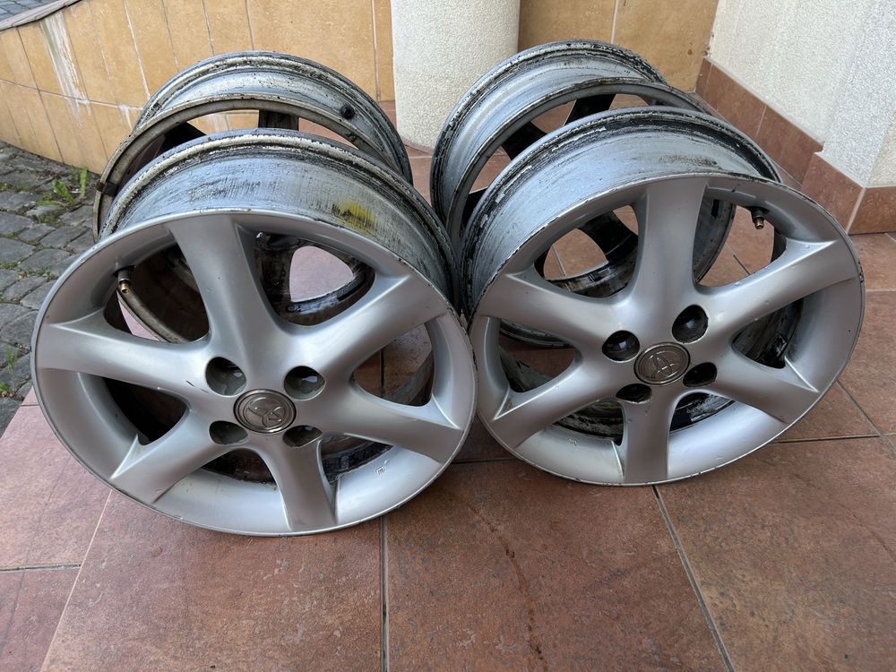 Alufelgi oryginalne do Toyoty Corolli E12