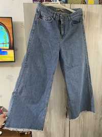 Жіночі світлі джинси кльош, М розмір