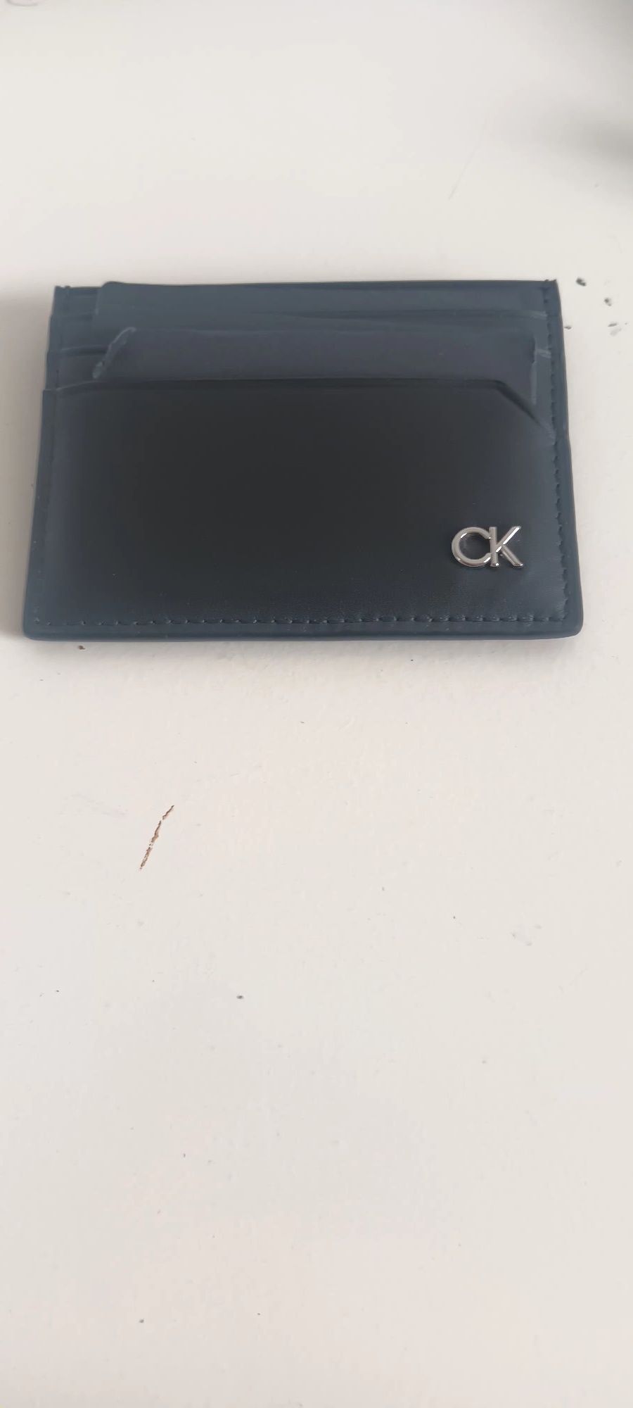 Carteira e cinto Calvin Klein