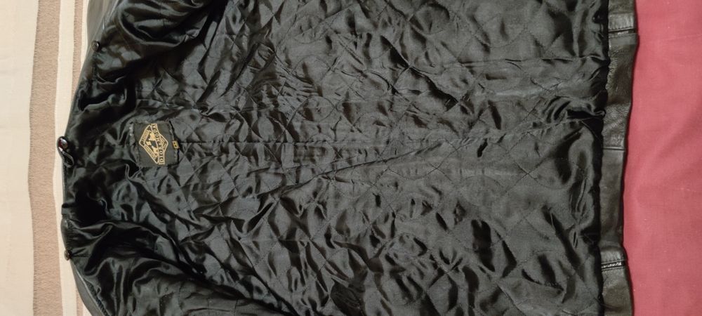 Женская зимняя кожаная куртка