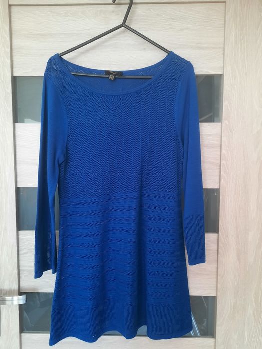 Dłuższy sweter ażurowy