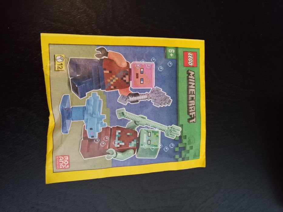 LEGO Minecraft minifigurki Poszukiwaczka Przygód+Utopiec+Aksolotl